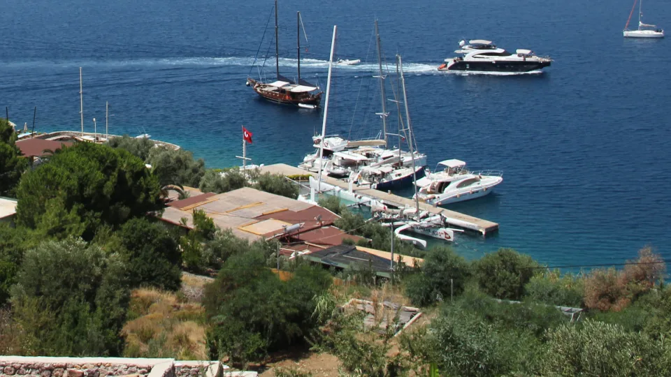 Generic sailing catamaran illustration: twin-hull yachts moored at Bozburun, Turkey