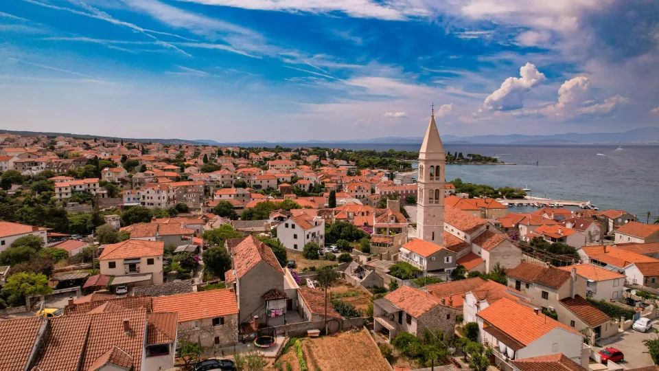 Stone buildings and waterfront in Kaštela.