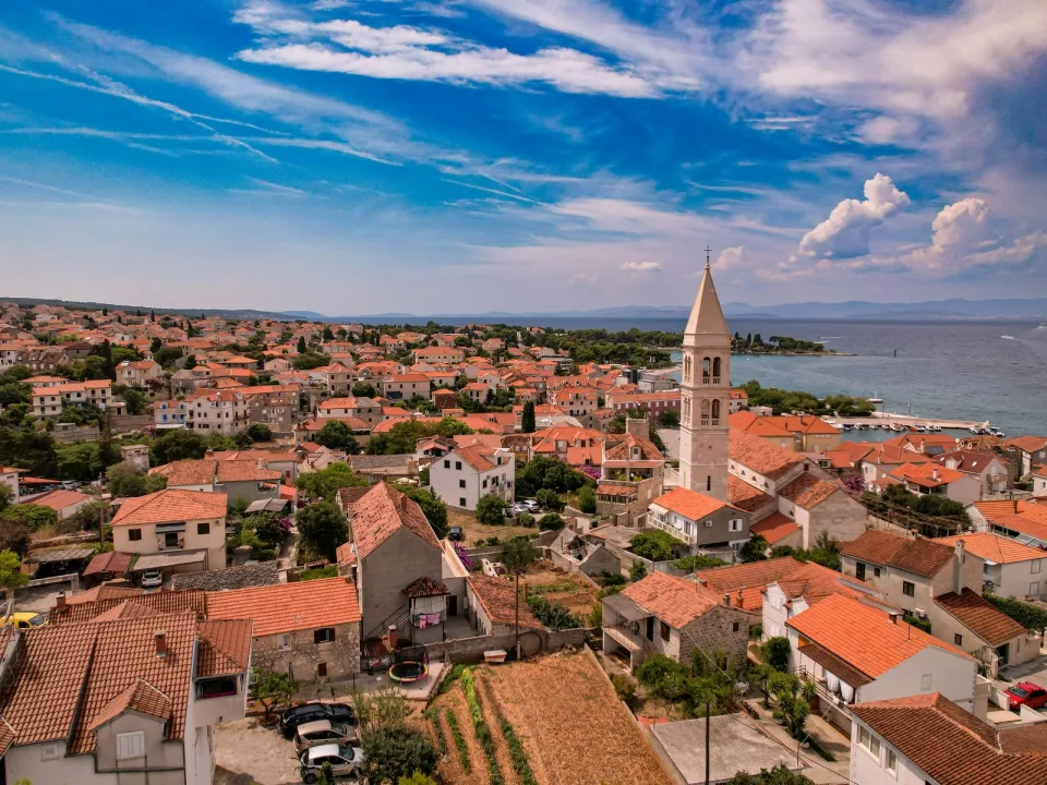 Stone buildings and waterfront in Kaštela.