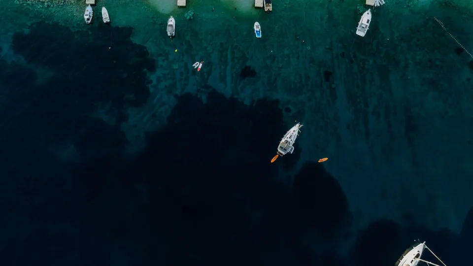 Boats off the Primošten coastline seen from above.