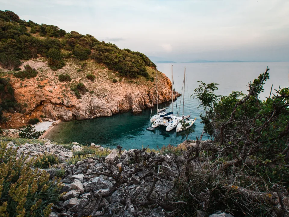 Yachts moored in a cove near Punat.