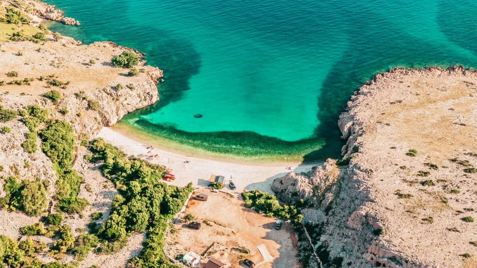 Rocky coast and clear water off Krk in the Kvarner region.