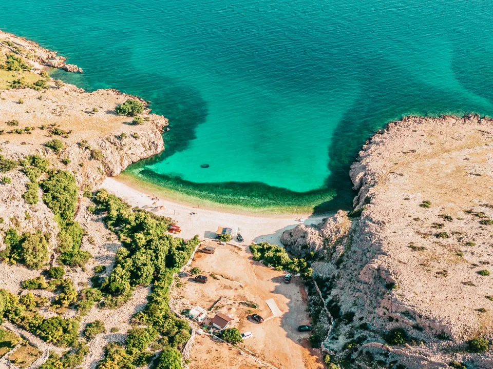 Rocky coast and clear water off Krk in the Kvarner region.