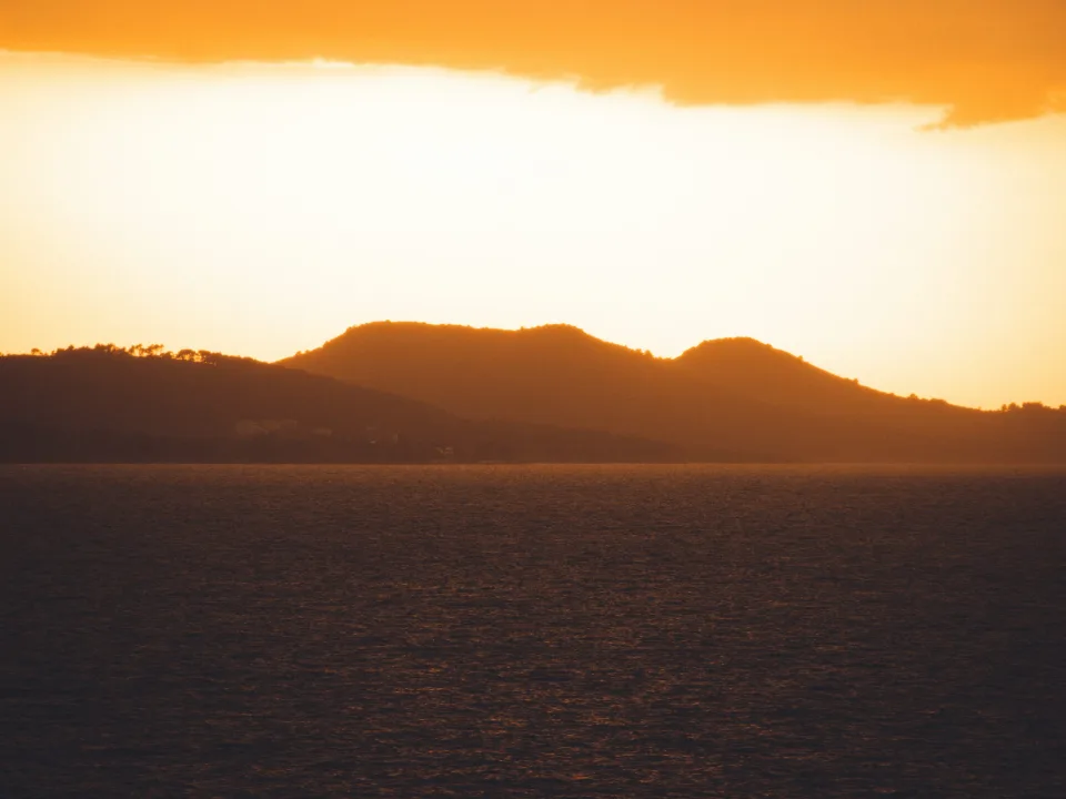 Regional sunset view of sea and coastal hills at Ugljan