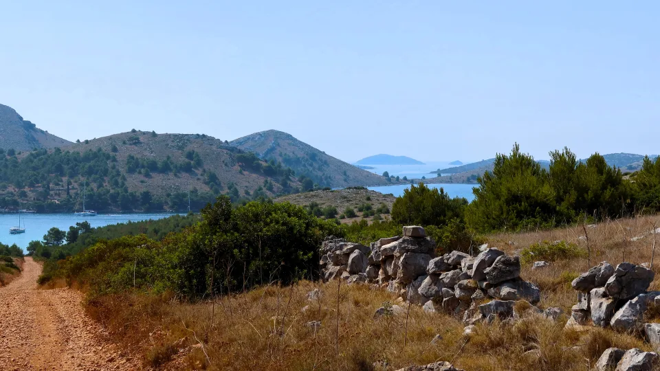 Regional view of Mala Proversa on Dugi Otok, with coastal hills and water