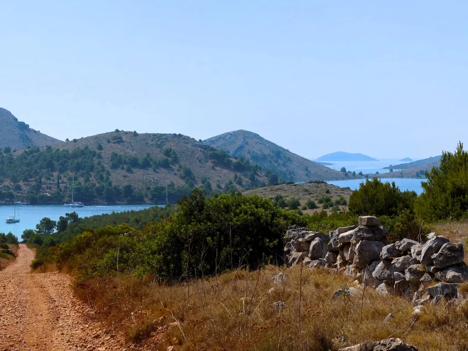 Regional view of Mala Proversa on Dugi Otok, with coastal hills and water