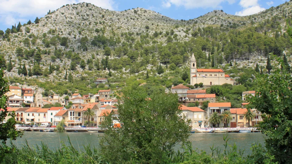 Regional view of Komin village across the Neretva River