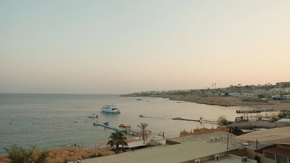 Sharm El Sheikh shoreline and boats at sunset