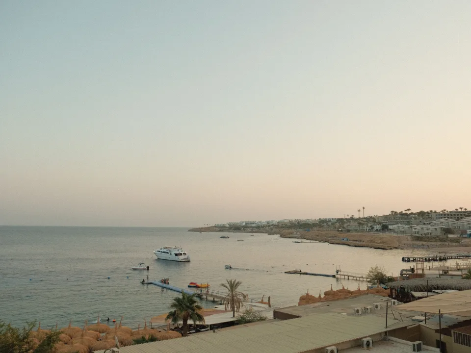 Sharm El Sheikh shoreline and boats at sunset