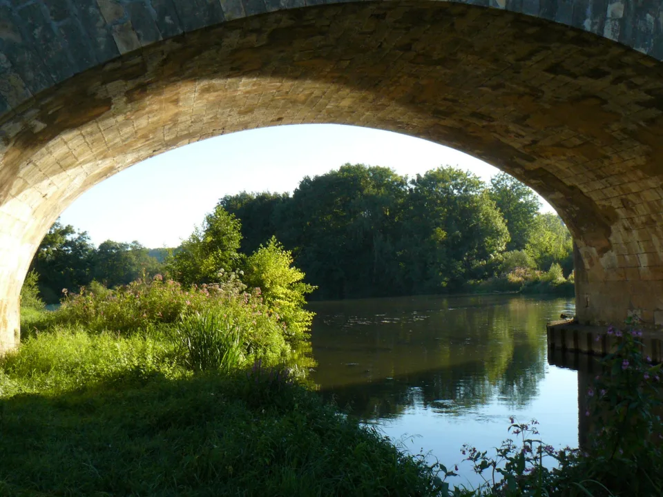 The Saône seen beneath a bridge arch at Port-sur-Saône