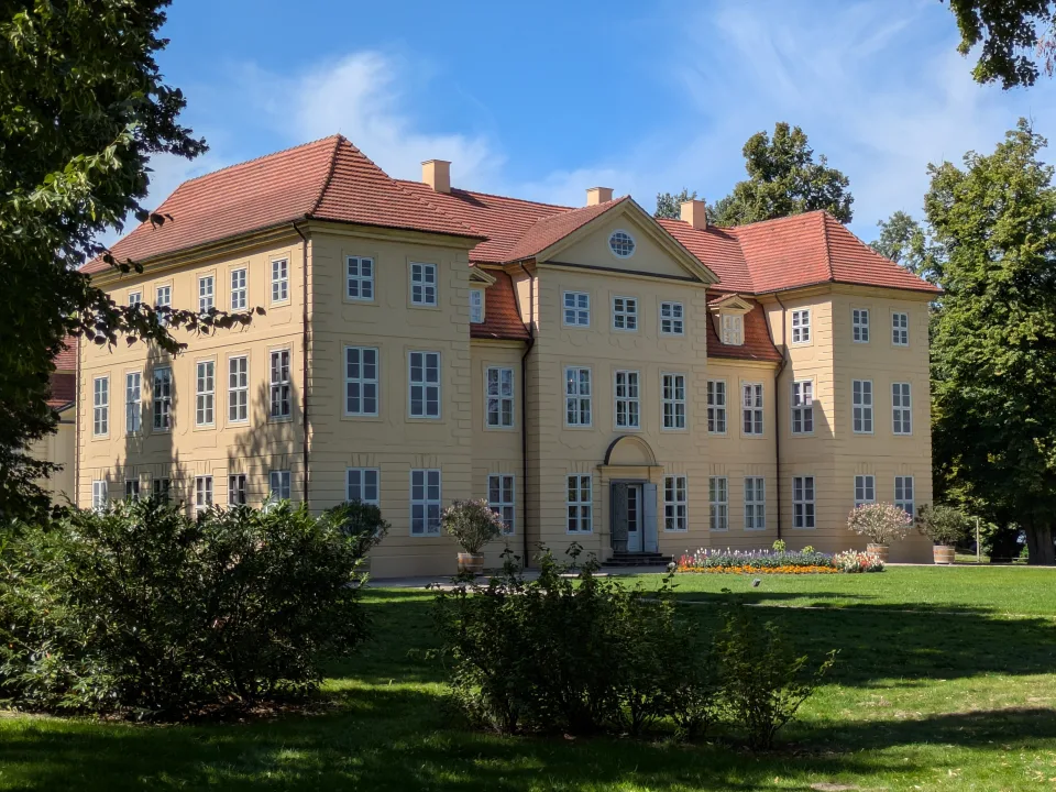 Mirow Castle with its garden and red roof