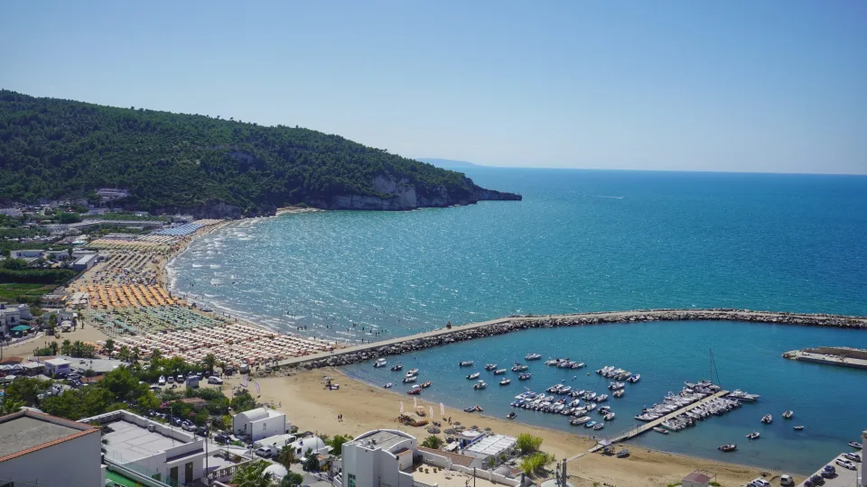 Regional view of Peschici beach and harbour on the Gargano coast
