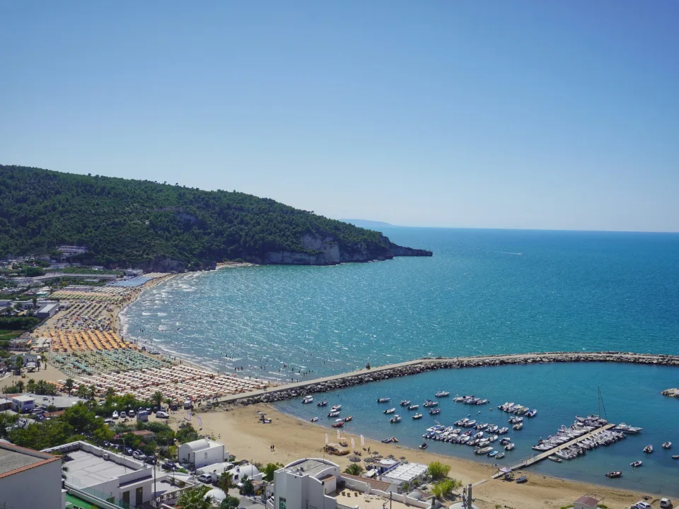 Regional view of Peschici beach and harbour on the Gargano coast