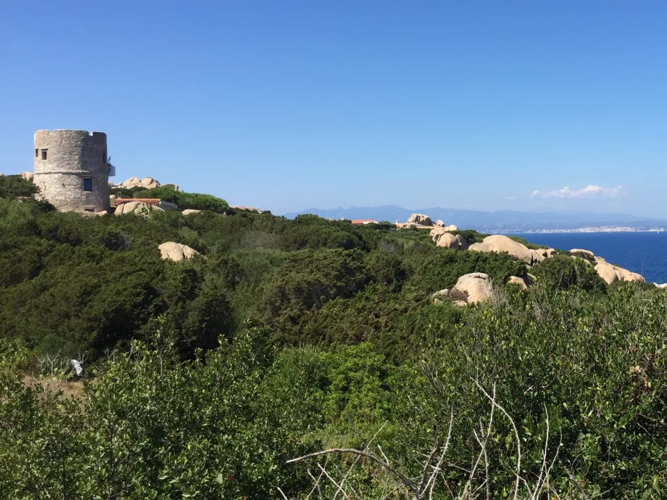 Regional coastal context: a stone tower, granite and sea at Capo Testa near Santa Teresa Gallura