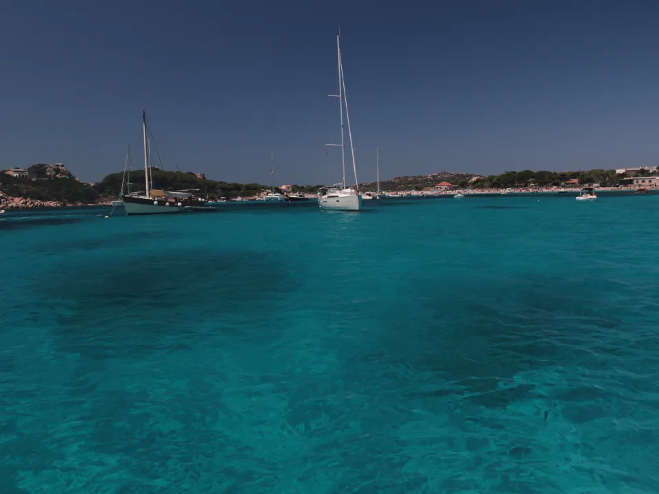 Regional island context: sailing yachts in a bay of the La Maddalena archipelago, northern Sardinia