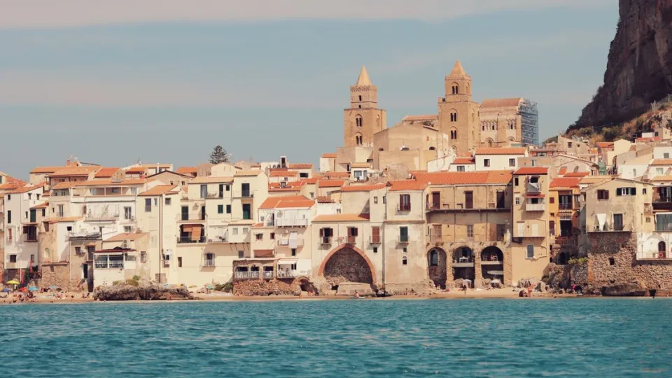Cefalu old town and cathedral seen from the sea