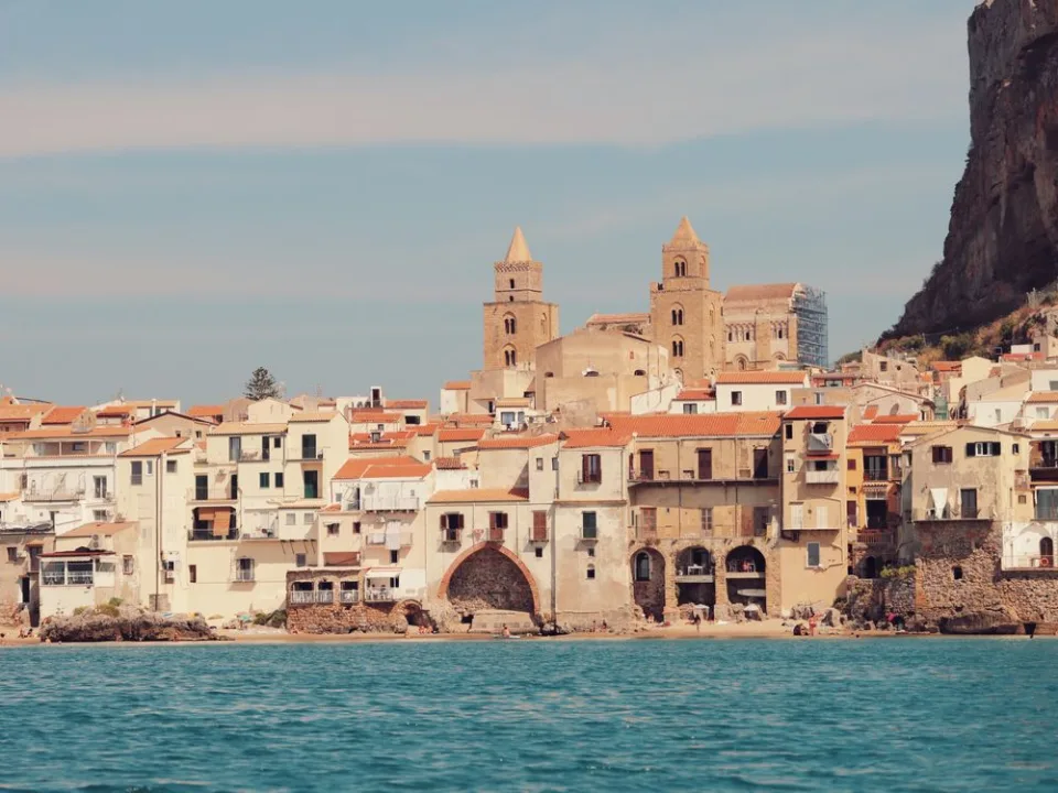 Cefalu old town and cathedral seen from the sea
