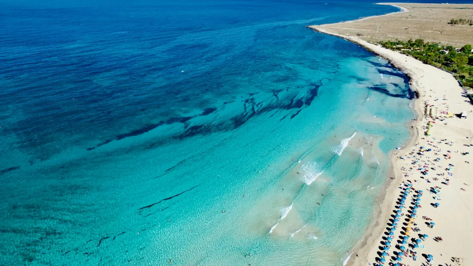Beach and turquoise water at San Vito Lo Capo