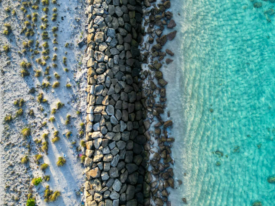 Rock-lined shoreline and water in Hulhumalé