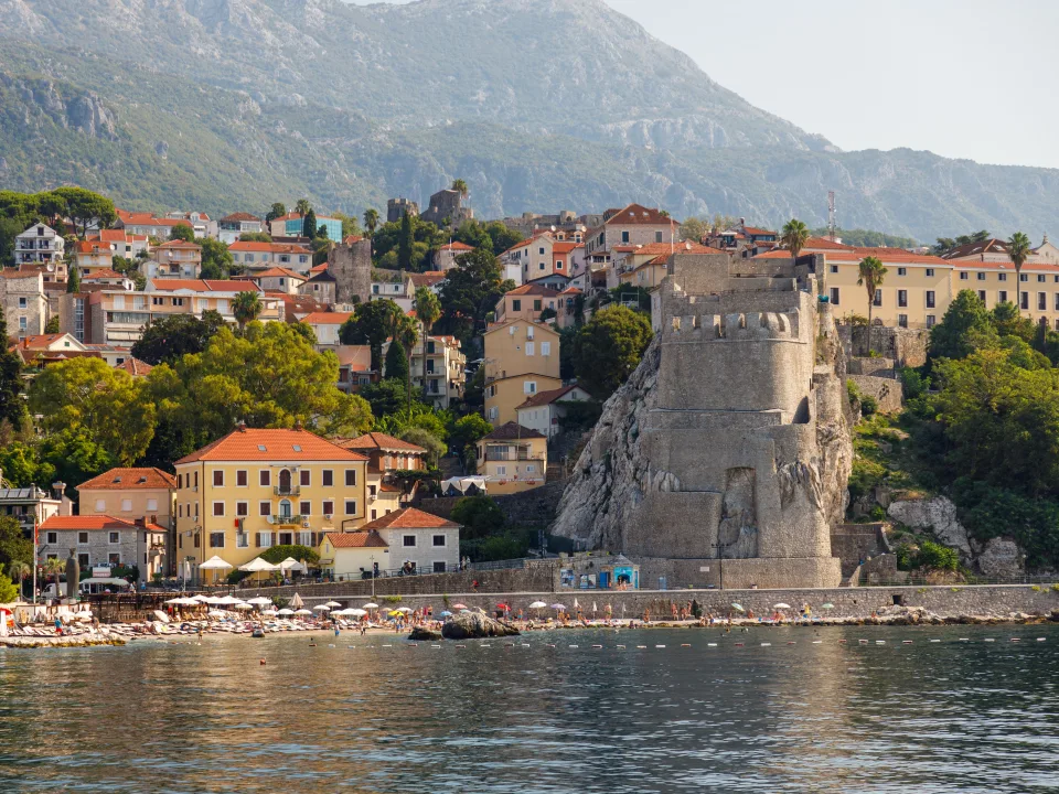 Herceg Novi coastline with waterfront buildings and hills