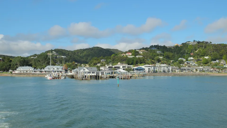 Paihia waterfront and wharf seen from the water in New Zealand