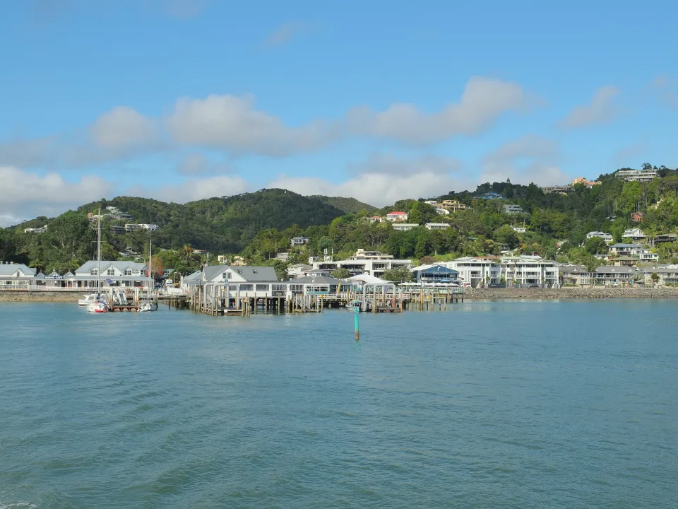 Paihia waterfront and wharf seen from the water in New Zealand