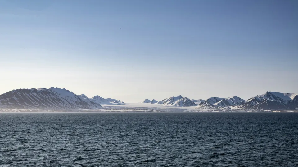 Coastal water and mountain ridge in Svalbard
