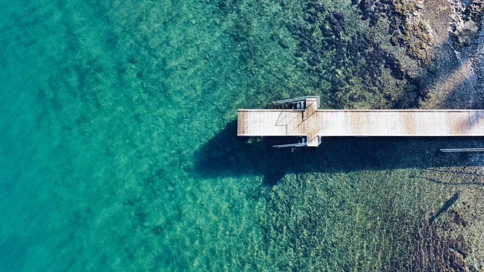 Svetilnik shoreline and wooden pier in Izola, Slovenia