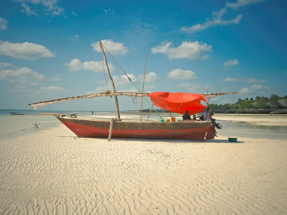 Traditional wooden boat on a Zanzibar shore