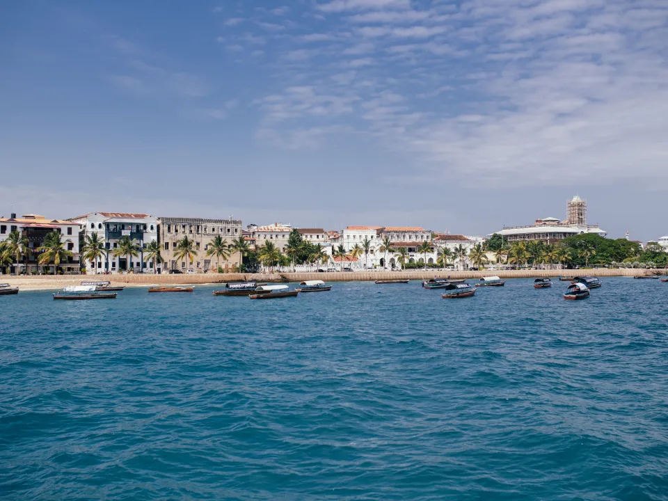 Stone Town waterfront and small boats in Zanzibar