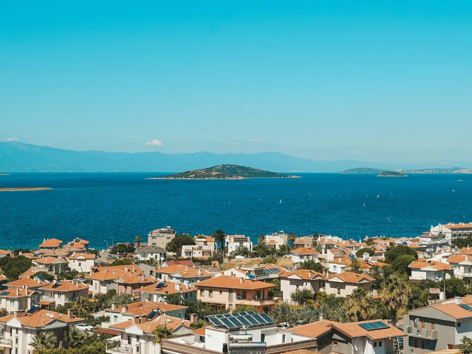 Regional Ayvalık coast context: Cunda rooftops and the Aegean Sea, Turkey