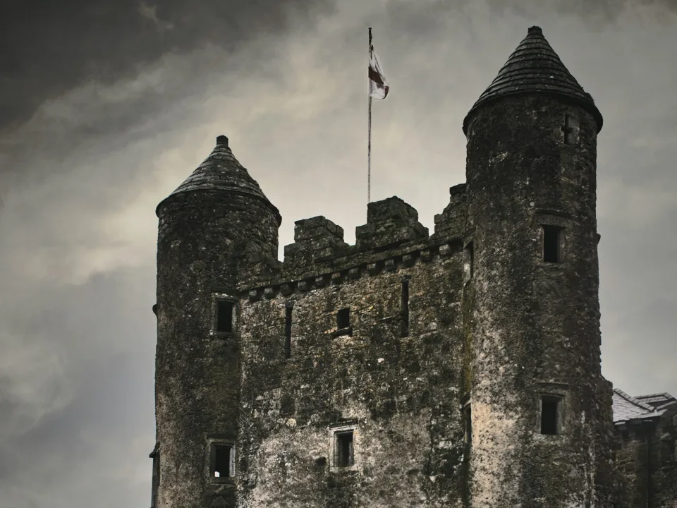 Regional shore context: Enniskillen Castle towers beneath cloudy skies in County Fermanagh, Northern Ireland