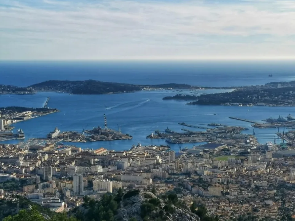 Regional Toulon Bay context: the harbour and coastline seen from Mont Faron.
