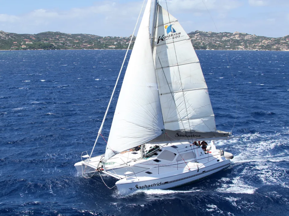 Sailing catamaran in the Strait of Maddalena, Sardinia