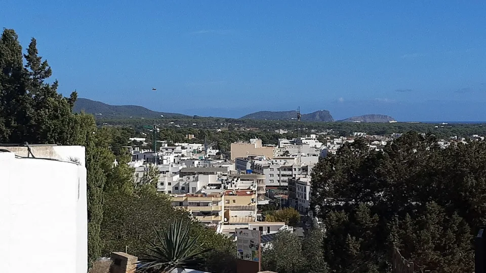 Santa Eulària des Riu and the coastline seen from the hilltop church.
