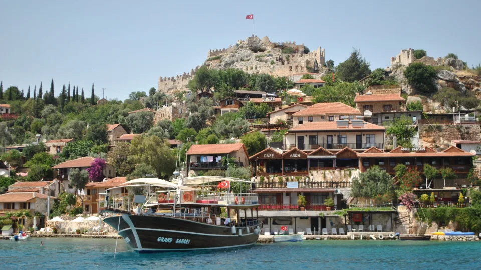 Regional Demre coast context: boats below the castle and village of Kaleköy.