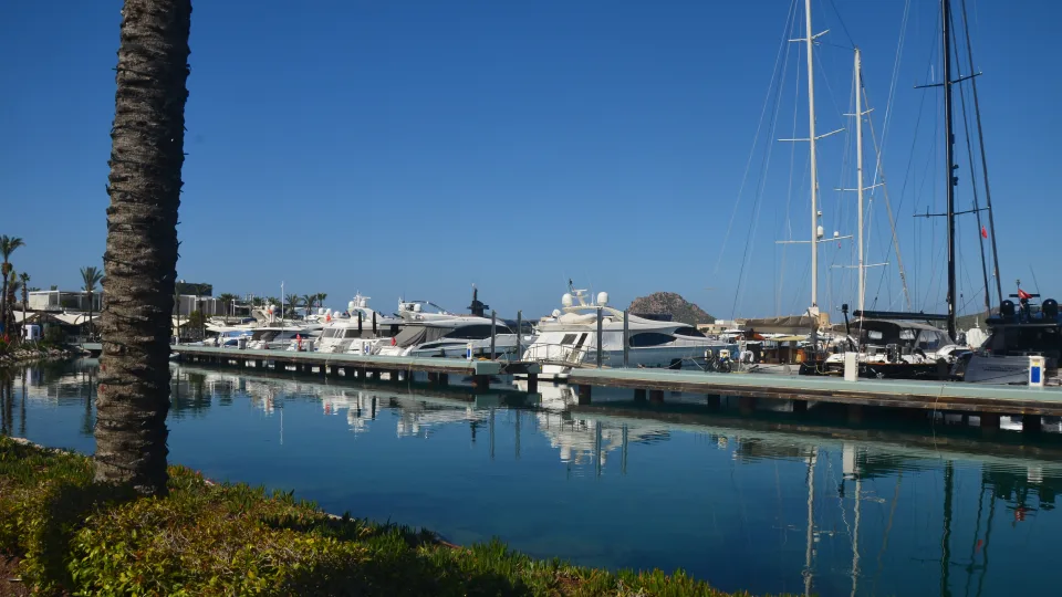 Large motor yachts moored at Yalıkavak marina in Turkey.